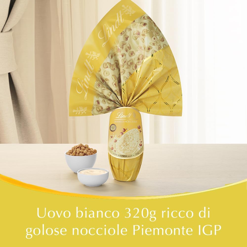 Lindt Uova di Pasqua Cioccolato Bianco e Nocciole, Uovo al Cioccolato Bianco con Nocciole Piemonte IGP, con Sorpresa, 320g