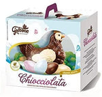 Chioccia di cioccolata con uova di cioccolato al latte e bianco la 